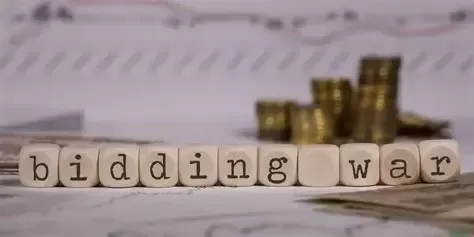 Hollywood Bidding War Erupts as Markets Await Fed